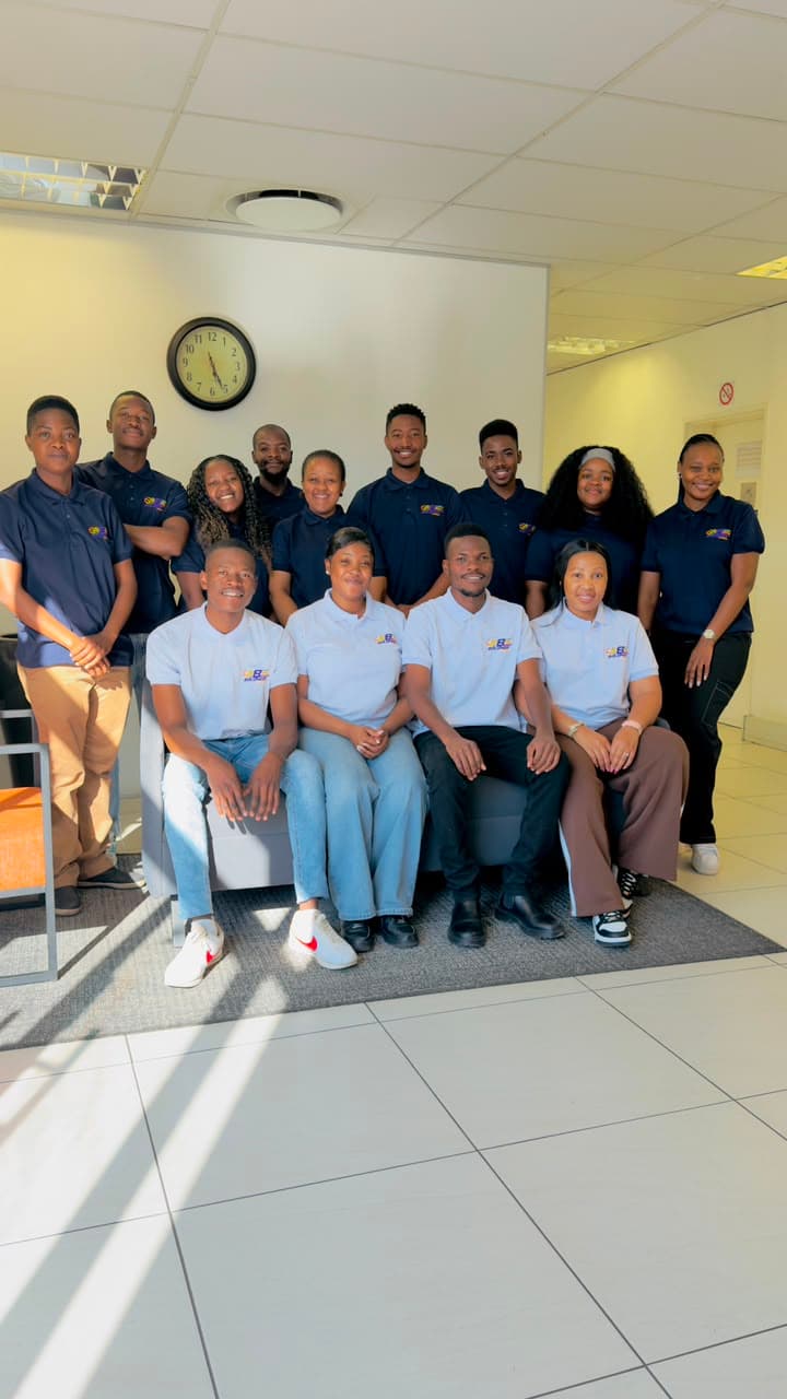 The Bolunga Systems team gathered together inside the office